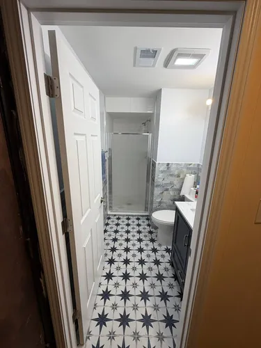 Completed bathroom seen from the new door