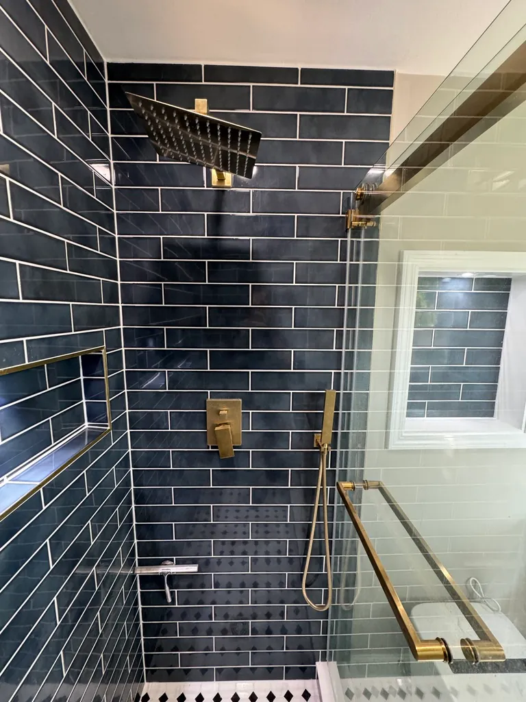 Navy tile walk-in shower