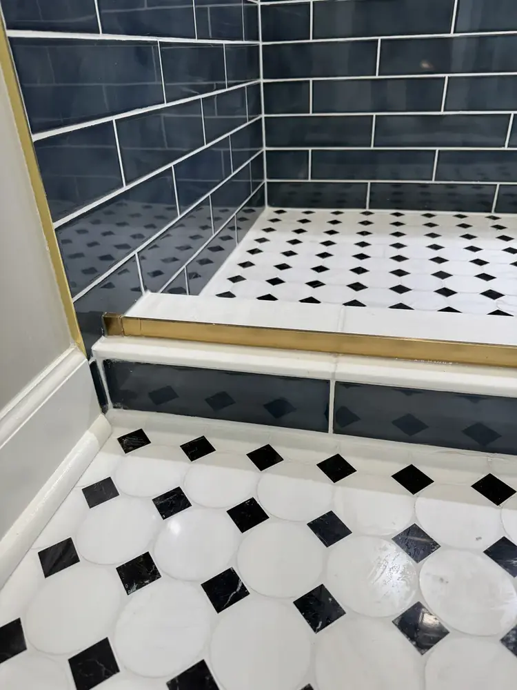 Finished bathroom view with tiled shower