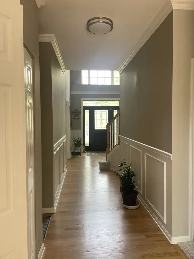 Close-up of crown moulding joints and paint finish